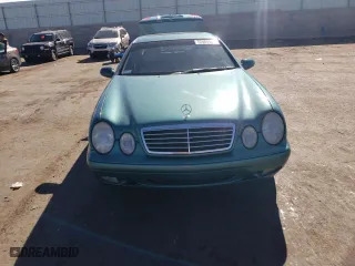 1999 Mercedes-Benz CLK-Class with VIN WDBLJ65G4XF071095, listed as a Copart auction lot 72080064 with 97,558 mi miles and Salvage Title. Bid and sale history available at carsss.com. Image 5.