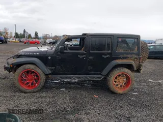 2018 Jeep Wrangler JK Unlimited Rubicon Recon with VIN 1C4BJWFG9JL844051, listed as a IAAI auction lot 40923174 with 64,309 mi miles. Bid and sale history available at carsss.com. Image 15.