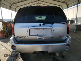 2005 GMC Envoy SLE with VIN 1GKDS13S852374516, listed as a Copart auction lot 42409725 with 299,816 mi miles and Salvage Title. Bid and sale history available at carsss.com. Image 6.
