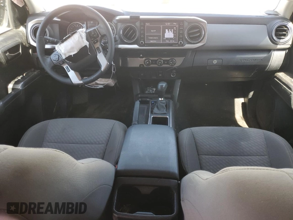 2022 Toyota Tacoma SR with VIN 3TYAX5GN9NT051570, listed as a Copart auction lot 49678735 with 52,709 mi miles and Salvage title. Bid and sale history available at DreamBid. Image 8.