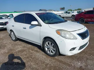 2014 Nissan Versa S with VIN 3N1CN7AP3EL808942, listed as a IAAI auction lot 42706295 with 148,964 mi miles and . Bid and sale history available at DreamBid. Image 1.