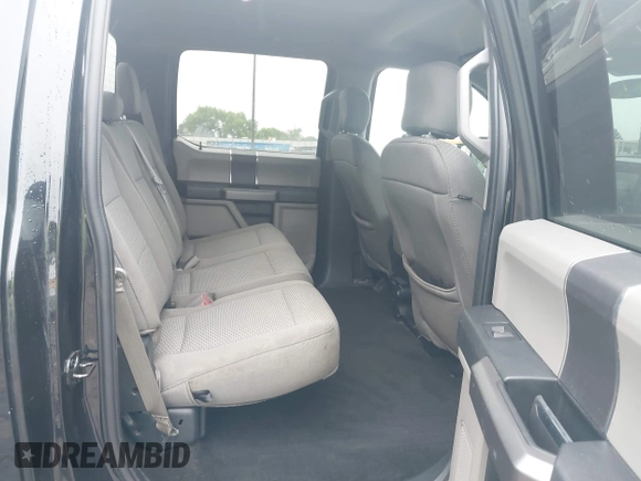 2019 Ford F-150 XL with VIN 1FTEW1C43KFC10164, listed as a IAAI auction lot 42342646 with 93,377 mi miles and . Bid and sale history available at DreamBid. Image 8.