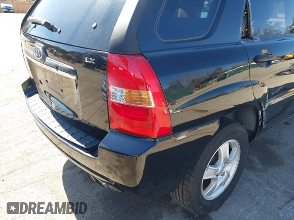 2007 Kia Sportage LX with VIN KNDJF724877313178, listed as a IAAI auction lot 41863492 with 199,138 mi miles. Bid and sale history available at carsss.com. Image 17.