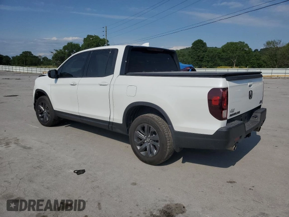 2021 Honda Ridgeline Sport with VIN 5FPYK3F18MB009882, listed as a Copart auction lot 57136205 with 43,549 mi miles and Salvage title. Bid and sale history available at DreamBid. Image 2.
