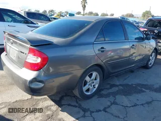 2003 Toyota Camry LE with VIN 4T1BE32K43U760354, listed as a IAAI auction lot 41547088 with 257,688 mi miles and . Bid and sale history available at DreamBid. Image 4.