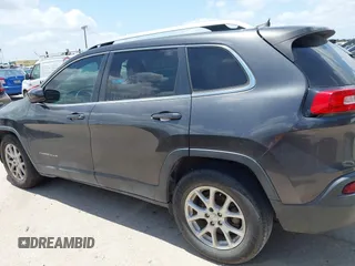 2016 Jeep Cherokee Latitude with VIN 1C4PJLCBXGW265431, listed as a IAAI auction lot 42542328 with 127,249 mi miles and . Bid and sale history available at DreamBid. Image 14.