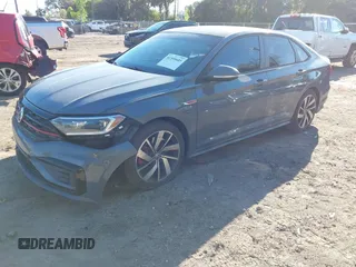 2019 Volkswagen Jetta GLI S z VIN 3VW6T7BU5KM169132, wystawiony jako IAAI lot #41599605 z przebiegiem 59 744 mil mil oraz . Historia ofert i sprzedaży dostępna na DreamBid. Obrazek 17.