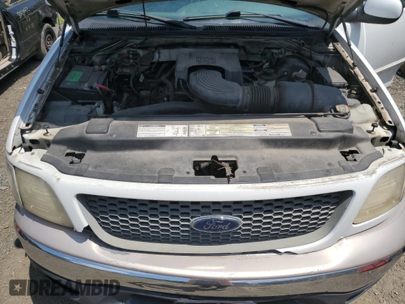 2000 Ford F-150 XL с VIN 1FTPF18L2YNA18807, выставлен на аукционе Copart как лот 62648305 с пробегом Не указан миль и Списание • Salvage title. История ставок и продаж доступна на DreamBid. Изображение 11.