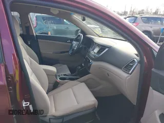 2017 Hyundai Tucson Value with VIN KM8J33A25HU530459, listed as a IAAI auction lot 40889753 with 62,223 mi miles. Bid and sale history available at carsss.com. Image 5.
