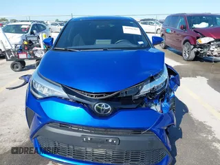 2021 Toyota C-HR LE z VIN NMTKHMBX0MR129151, wystawiony jako IAAI lot #41990301 z przebiegiem 25 277 mil mil oraz . Historia ofert i sprzedaży dostępna na DreamBid. Obrazek 13.