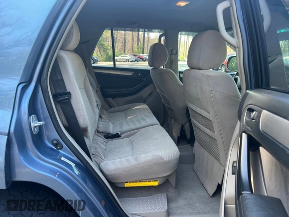 2004 Toyota 4Runner SR5 with VIN JTEBT14R340041772, listed as a Copart auction lot 54595695 with 210,561 mi miles and Clean Title. Bid and sale history available at DreamBid. Image 6.
