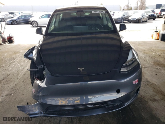 2023 Tesla Model Y Long Range with VIN 7SAYGDEEXPA137582, listed as a Copart auction lot 46869265 with 16,474 mi miles and Salvage Title. Bid and sale history available at carsss.com. Image 5.