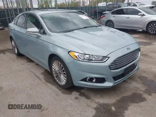 2014 Ford Fusion Titanium Hybrid with VIN 3FA6P0RU3ER351008, listed as a IAAI auction lot 42016579 with 103,760 mi miles and . Bid and sale history available at carsss.com. Image 1.