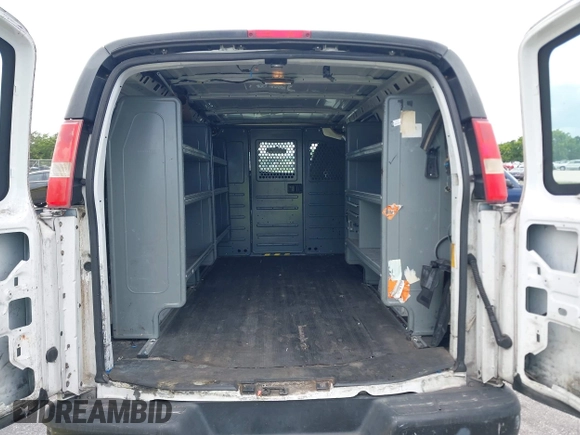 2014 Chevrolet Express Cargo Van with VIN 1GCWGFFA2E1111014, listed as a IAAI auction lot 42190194 with 97,172 mi miles. Bid and sale history available at carsss.com. Image 8.