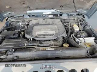 2014 Jeep Wrangler Unlimited Rubicon with VIN 1C4BJWFG4EL141706, listed as a Copart auction lot 51305235 with 106,919 mi miles and Salvage Title. Bid and sale history available at carsss.com. Image 11.