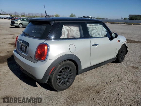 2017 MINI Hardtop Cooper with VIN WMWXP5C34H2F61072, listed as a Copart auction lot 57314695 with 46,693 mi miles and Salvage title. Bid and sale history available at DreamBid. Image 3.