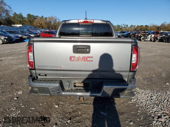 2018 GMC Canyon 2WD SLE z VIN 1GTG5CEN3J1260538, wystawiony jako Copart lot #84157414 z przebiegiem 135 488 mil mil oraz Szkoda całkowita • Salvage title. Historia ofert i sprzedaży dostępna na DreamBid. Obrazek 6.