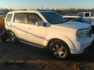 2015 Honda Pilot Touring with VIN 5FNYF4H91FB066966, listed as a IAAI auction lot 41747604 with 113,165 mi miles. Bid and sale history available at carsss.com. Image 1.