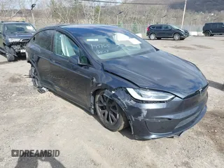 2023 Tesla Model X with VIN 7SAXCDE52PF425834, listed as a IAAI auction lot 41996298 with Not Provided miles and . Bid and sale history available at DreamBid. Image 1.