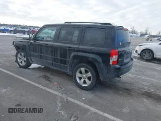 2014 Jeep Patriot Latitude with VIN 1C4NJRFBXED687701, listed as a IAAI auction lot 41399153 with 109,783 mi miles. Bid and sale history available at carsss.com. Image 3.
