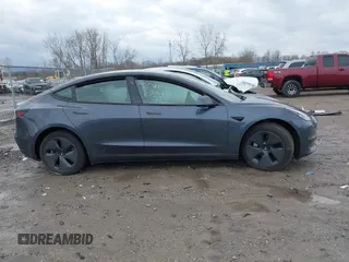 2022 Tesla Model 3 Long Range with VIN 5YJ3E1EB8NF201023, listed as a IAAI auction lot 41942943 with 30,635 mi miles and . Bid and sale history available at DreamBid. Image 12.