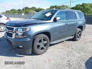 2020 Chevrolet Tahoe LT with VIN 1GNSCBKC4LR246060, listed as a IAAI auction lot 41272902 with 105,417 mi miles and . Bid and sale history available at DreamBid. Image 16.