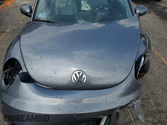 2006 Volkswagen Beetle z VIN 3VWRR31C26M401236, wystawiony jako Copart lot #72189394 z przebiegiem Nie podano mil oraz Szkoda całkowita • Salvage title. Historia ofert i sprzedaży dostępna na DreamBid. Obrazek 11.