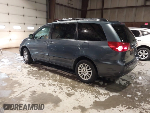 2009 Toyota Sienna XLE with VIN 5TDBK22C29S028110, listed as a IAAI auction lot 41496169 with 253,057 mi miles and . Bid and sale history available at DreamBid. Image 3.