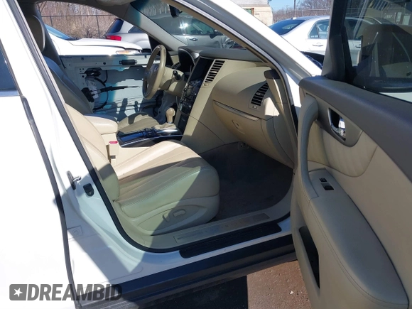 2013 Infiniti FX with VIN JN8CS1MW9DM171618, listed as a IAAI auction lot 41847098 with 235,901 mi miles and . Bid and sale history available at DreamBid. Image 5.