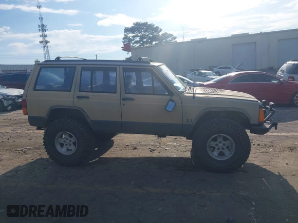 1995 Jeep Cherokee Sport with VIN 1J4FJ68S3SL555908, listed as a IAAI auction lot 42222016 with 283,444 mi miles and . Bid and sale history available at DreamBid. Image 13.
