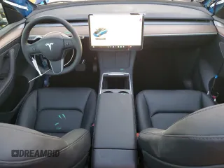 2025 Tesla Model Y Long Range with VIN 7SAYGDEDXSF232808, listed as a Copart auction lot 85647524 with 183 mi miles and Salvage Title. Bid and sale history available at DreamBid. Image 8.
