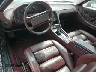 1988 Porsche 928 z VIN WP0JB0921JS860322, wystawiony jako Copart lot #58960975 z przebiegiem 136 427 mil mil oraz Szkody całkowita. Historia ofert i sprzedaży dostępna na DreamBid. Obrazek 8.