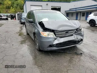 2012 Honda Odyssey EX-L with VIN 5FNRL5H64CB035196, listed as a Copart auction lot 71566704 with 243,529 mi miles and Salvage Title. Bid and sale history available at carsss.com. Image 11.