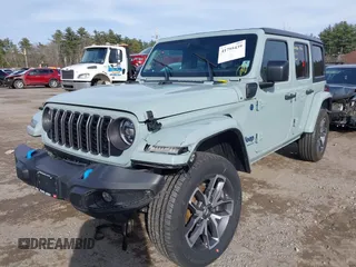 2024 Jeep Wrangler Sport S with VIN 1C4RJXN65RW166079, listed as a IAAI auction lot 41795439 with 14,937 mi miles and . Bid and sale history available at DreamBid. Image 2.
