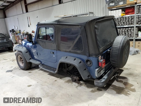 2003 Jeep Wrangler Sport with VIN 1J4FA49S23P344132, listed as a Copart auction lot 73292894 with 147,252 mi miles and Salvage Title. Bid and sale history available at carsss.com. Image 2.