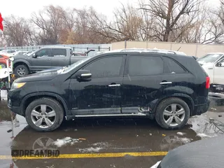 2012 Kia Sorento EX with VIN 5XYKUDA2XCG301636, listed as a IAAI auction lot 41619793 with 220,692 mi miles. Bid and sale history available at carsss.com. Image 14.