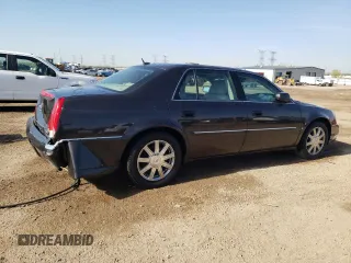 2008 Cadillac DTS 1SC z VIN 1G6KD57Y68U111388, wystawiony jako Copart lot #54204465 z przebiegiem 122 077 mil mil oraz Szkoda całkowita • Salvage title. Historia ofert i sprzedaży dostępna na DreamBid. Obrazek 3.