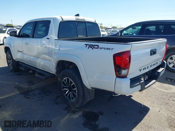 2021 Toyota Tacoma SR with VIN 3TYAX5GN5MT014868, listed as a IAAI auction lot 41549927 with 30,653 mi miles and . Bid and sale history available at DreamBid. Image 3.