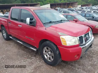 2007 Nissan Titan XE z VIN 1N6BA07A67N211704, wystawiony jako IAAI lot #42433356 z przebiegiem 295 163 mil mil oraz . Historia ofert i sprzedaży dostępna na DreamBid. Obrazek 1.