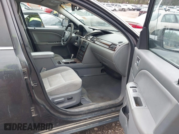 2007 Ford Five Hundred SEL z VIN 1FAHP27157G152811, wystawiony jako IAAI lot #41843996 z przebiegiem Nie podano mil oraz . Historia ofert i sprzedaży dostępna na DreamBid. Obrazek 5.