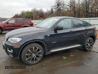 2014 BMW X6 50i z VIN 5UXFG8C59EL592711, wystawiony jako Copart lot #79897194 z przebiegiem 78 551 mil mil oraz Szkoda całkowita • Salvage title. Historia ofert i sprzedaży dostępna na DreamBid. Obrazek 1.