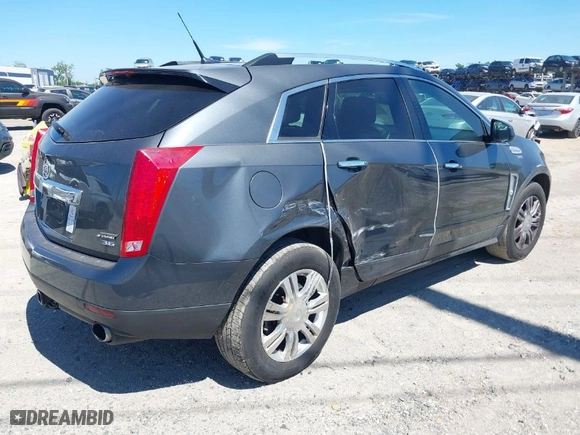 2013 Cadillac SRX Luxury Collection with VIN 3GYFNGE35DS610590, listed as a IAAI auction lot 41889588 with 172,769 mi miles. Bid and sale history available at carsss.com. Image 4.