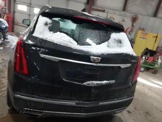 2021 Cadillac XT5 FWD Premium Luxury with VIN 1GYKNCRS3MZ198651, listed as a IAAI auction lot 41607734 with 49,275 mi miles. Bid and sale history available at carsss.com. Image 16.