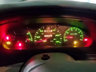 2002 Ford Taurus SES Standard z VIN 1FAFP55U72A161401, wystawiony jako Copart lot #55893125 z przebiegiem 128 258 mil mil oraz Czysty tytuł • Clean title. Historia ofert i sprzedaży dostępna na DreamBid. Obrazek 9.
