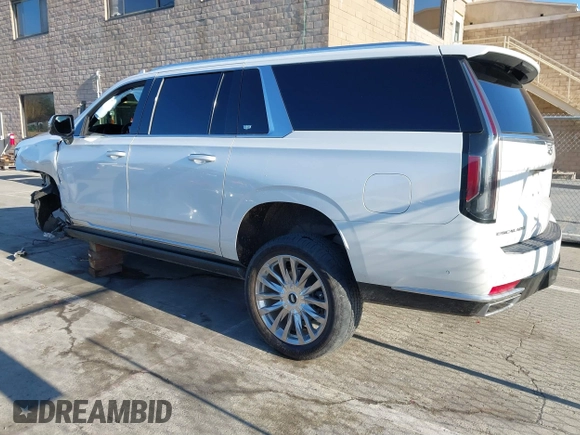 2021 Cadillac Escalade ESV Premium Luxury z VIN 1GYS4LKL2MR264645, wystawiony jako IAAI lot #41013027 z przebiegiem 103 454 mil mil oraz . Historia ofert i sprzedaży dostępna na DreamBid. Obrazek 3.