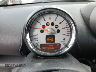 2012 MINI Countryman z VIN WMWZB3C56CWM01948, wystawiony jako Copart lot #54781705 z przebiegiem 128 374 mil mil oraz Szkoda całkowita • Salvage title. Historia ofert i sprzedaży dostępna na DreamBid. Obrazek 9.