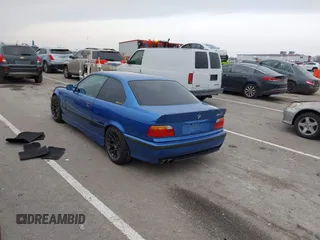 1999 BMW 3 Series M3 with VIN WBSBG9336XEY80979, listed as a IAAI auction lot 41179676 with 262,233 mi miles. Bid and sale history available at carsss.com. Image 3.