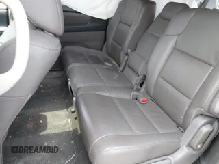2012 Honda Odyssey Touring with VIN 5FNRL5H91CB121950, listed as a IAAI auction lot 42456620 with 200,831 mi miles and . Bid and sale history available at DreamBid. Image 8.