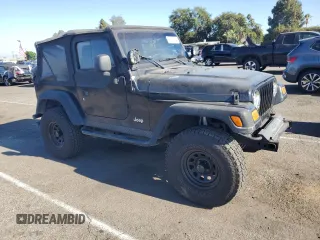 2005 Jeep Wrangler Rubicon with VIN 1J4FA69SX5P343826, listed as a Copart auction lot 69074374 with 179,610 mi miles and Salvage Title. Bid and sale history available at carsss.com. Image 4.