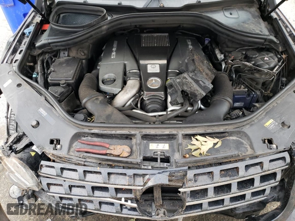2015 Mercedes-Benz M 63 AMG with VIN 4JGDA7EB0FA440509, listed as a Copart auction lot 73954174 with 74,650 mi miles and Salvage Title. Bid and sale history available at carsss.com. Image 14.
